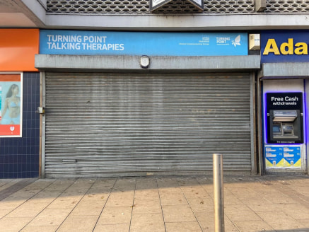 The property comprises a ground floor retail unit set within a large purpose built retail block fronting Carlton Street. Internally the accommodation is arranged to provide a sales area with separate toilet & kitchen to the rear.