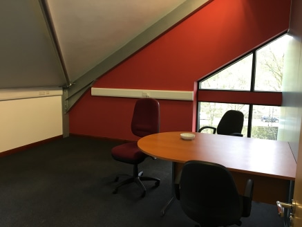 The vacant suite is on the second/attic floor of a larger two storey with attic and basement parking purpose-built office property, being of a steel frame construction with cladded elevations and a profile sheet insulated roof with Velux's.

Internal...