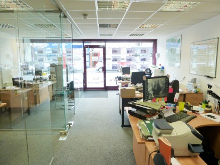 The property comprises of a ground floor shop/office with a total area of 1,389 sqft (129.02 sqm). The property benefits from a front electric roller shutter, alarm, 6 x air conditioning units, gas central heating, C.C.T.V., glass partitioning, entry...