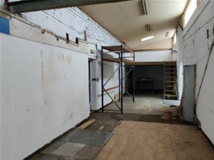 The premises comprise a steel truss frame industrial/warehouse unit of traditional brickwork elevations to a dual bay pitched roof. Access is provided via three electric shutter loading doors and a dedicated loading bay. Ancillary office accommodatio...