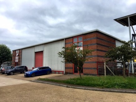 The property comprises a steel portal framed building with part brick and part profile metal clad elevations and pitched profile metal clad roof.

Internally the property is laid out to main workshop space with entrance lobby, three WC's, office and...