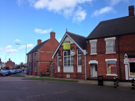 The property is situated in Rugeley town centre in a prominent corner position at the junction of Anson Street with Elmore Lane. Rugeley is a small market town located in Mid-Staffordshire lying approximately ten miles south-east from Stafford, eight...