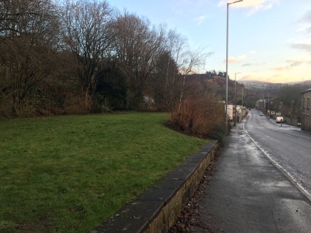 The property briefly comprises a broadly rectangular parcel of land with frontage on to Halifax Road. The site is of a relatively level topography throughout and comprises mostly lawn together with some smaller areas of shrubbery.

The property benef...