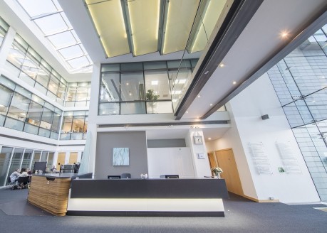 The building boasts a full-height atrium and large open-plan reception area offering meeting rooms, offices, co-working & kitchen facilities