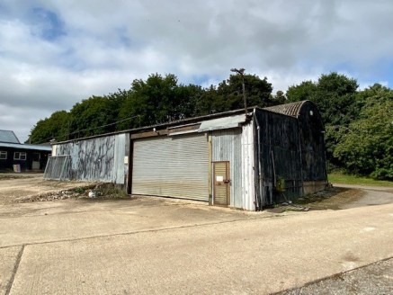 Workshop (Lower)

Steel framed building, concrete floor, roller shutter door to the front, 3 phase electricity, strip lighting and an eaves height of 3.55m.

Workshop (Upper)

Steel framed building, concrete floor, strip lights, two loading doors, 3...