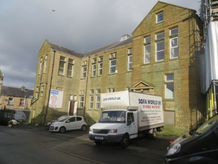 LOCATION\n\nWesley Street is situated just off Burnley Road in Brierfield town centre being situated to the rear of the Zion Church.\n\nDESCRIPTION\n\nA substantial two storey building that has been used for light manufacturing together with a showro...