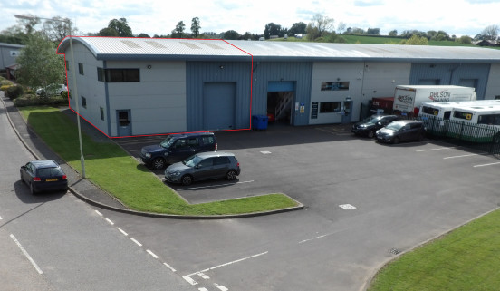 Semi-detached unit to let. 

The unit is of steel portal frame structure with a fully insulated profile metal sheet roof incorporating translucent roof lighting.