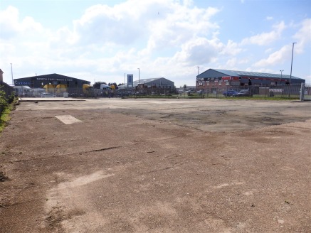 Prominently located secure compound site on junction of Kingstown Broadway and Parkhill Road.<br><br>Surfaced in a mixture of concrete, tarmac and compacted hardcore.<br><br>All services available to site.<br><br>0.627 acres (0....