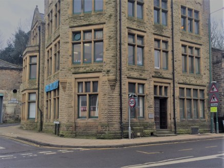 The premises briefly comprise the ground floor of a stone built detached character office building having a prominent roadside position on the busy A6033 into Todmorden and situated directly next to Morrisons supermarket.

Internally the premises ben...