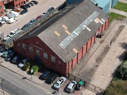 A steel truss framed warehouse building of brickwork construction to a pitched roof with a clear open-plan layout with dedicated loading and ample gated parking.\n\nAccommodation\n\nAll measurements are approximate and measured on a gross internal ar...