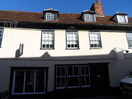 The subject property comprises an attractive period mid terraced building offering ground and first floor retail/office accommodation and attic storage. The property has rendered wall finishes with sash windows beneath a pitched tiled roof and benefi...