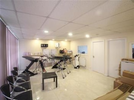 The unit comprises a mid-terraced warehouse facility situated over two floors with storage / production space to the ground floor and offices or further storage space to the first floor which is accessed via a dedicated stairwell. The unit is of bric...
