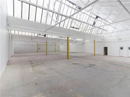 The premises comprise a mid-terrace brick built open plan warehouse unit to a pitched roof located within a securely gated estate. Access is provided via a roller shutter loading door serviced by a dedicated loading bay....