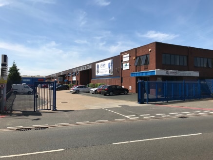 The property comprises an end-of-terrace unit constructed of steel portal frame with brick and block infill combined with profiled steel cladding. The unit was constructed in the mid-to-late 1980s and provides good amenities with offices at ground an...