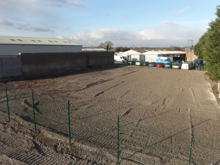 The yard is located off the A483 and within a secure estate compromising several industrial buildings and two parcels of land. 

The yard is available on a new lease for a term to be agreed at an asking rent of £15,000 per annum.