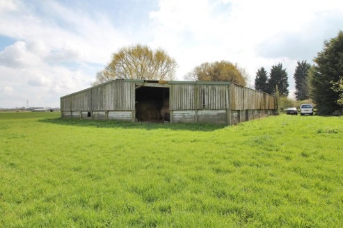 A rare opportunity to purchase a smallholding with detached farmhouse, range of general purpose farm buildings (two with residential consents) and good sized yards, all in a rural location with access to main line stations. In all approximately 22.02...