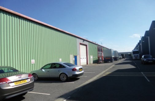 RECENTLY REFURBISHED IN 2019

The premises comprise a single storey mid terraced steel portal frame industrial unit. The external walls are of insulated profile metal cladding with the roof being pitched and surmounted with insulated profile metal cl...