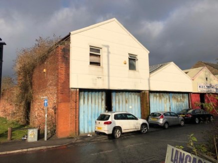 The property comprises a 6,334 sq.ft predominantly open plan warehouse with an eaves height of 4.4m.<br><br>Access to the unit is through a large concertina door, which fronts onto Dock Street....