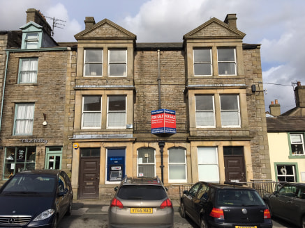 The property comprises a substantial three storey stone built former banking premises under a pitched slate covered roof. Internally the accommodation briefly comprises a banking hall, vault, office and stores at ground floor level, with three office...