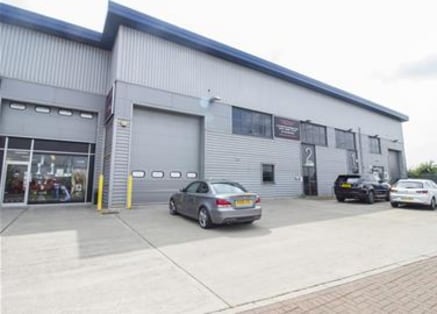 The property comprises a modern steel portal framed mid-terraced warehouse/storage unit constructed in approximately 2006 of part blockwork elevations covered with profile sheet metal cladding to a mono pitched roof. The warehouse also benefits from...