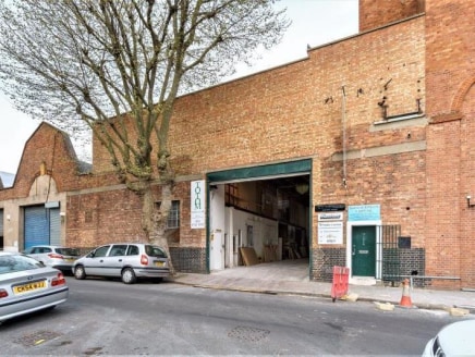 INDUSTRIAL / WAREHOUSE UNIT WITH 6.7m CLEAR EAVES HEIGHT - UNDER REFURBISHMENT\n\nThe property comprises a mid-terraced industrial/warehouse unit which we are advised was historically used for the manufacturing of tanks during World War II.\n\nThe pr...