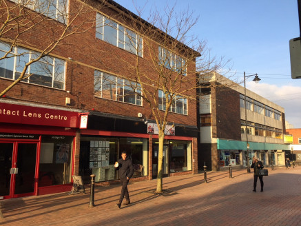 The property occupies a secondary trading position in Stafford town centre just off the main shopping thoroughfare and is situated on the north side of the pedestrianised Stafford Street between its junctions with Princes Street and Gaolgate Street.<...