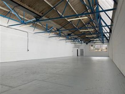 The premises comprise a steel truss frame warehouse/industrial unit of a clear open plan configuration benefiting from a roller shutter loading door, serviced by a dedicated loading bay. Car parking is available on the estate....