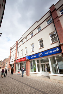 Ground floor retail unit adjacent to Dream Doors and Boots Opticians.<br>1,340 sq ft of ground floor space, ready to be fitted out to meet an individual occupier's requirements.<br>Regular shape with return frontage onto Two Lions Square.<br><br>Term...