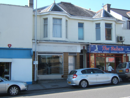 The premises comprise a ground floor retail unit with rear kitchen area and WC.
