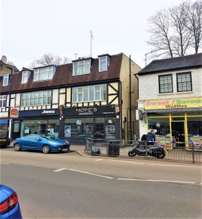 End of terrace ground floor commercial unit trading as a barbers with 2 x one bedroom flats above over two floors and a spacious area to the rear of the property which could be used to extend the existing and or build independently
