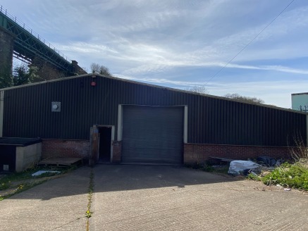 The subject property comprises a single storey steel frame industrial unit being brick built and with a dual pitch profile sheet roof incorporating Perspex roof lights with a solid concrete floor throughout.

Internally the property provides workshop...