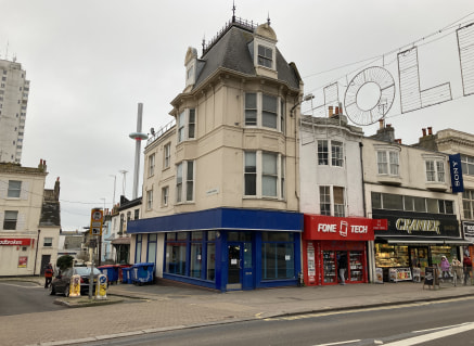 PROMINENT CORNER BUILDING TO LET