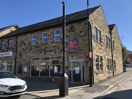 The property comprises a modern two-storey retail unit.

It provides open plan space on each floor that has been divided up to provide a banking hall, offices, strong room and stores at ground floor, with three offices, stores, staff room and toilets...