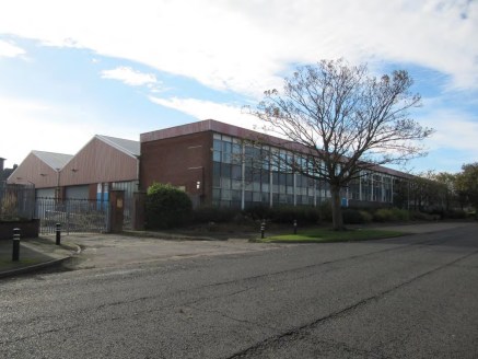 The premises comprise a 2 bay factory unit which fronted by a two storey office and ancillary block. The factory space is of steel portal framed construction with brick work walls and a pitched mineral felt covered roof supported on metal decking and...