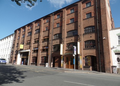 Mid terrace 5 storey 19th Century depositary warehouse with brickwork elevations incorporating mainly UPVC double glazed windows beneath double pitched timber trussed roof with slate covering incorporating roof lights. Used as a specialist climbing a...