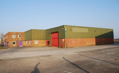 Rear access. Electric operated roller shutter door. Integral office accommodation. Reinforced concrete floor. W/C facilities. Dedicated car parking.