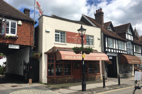 Overlooking the Green and the statues of Sir Winston Churchill and General James Wolfe, the property comprises the ground floor showroom and basement store of an attractive double fronted period building. Internally, the shop is broadly rectangular i...