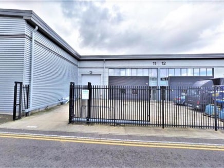 INDUSTRIAL / BUSINESS UNIT WITHIN WELL ESTABLISHED INDUSTRIAL ESTATE\n\nAmenities\n\n* Electric up & over shutter loading door\n\n* Minimum eaves height of 7m\n\n* Gated yard and car parking\n\n* Floor lighting in warehouse\n\n* Three phase power & g...