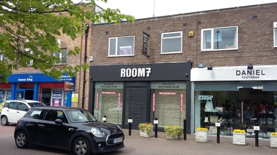 DESCRIPTION\n\nThe available space comprises a ground floor retail shop with rear store, WC and access to the rear from the back road. The premises form part of a larger building constructed in brick under a flat roof....