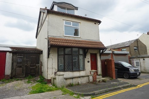 A Garage/Workshop with attached House located to the rear of Dickson Road close to the Imperial Hotel. The garage has been previously been an MOT Station but has not been in use for some time. Approx 4,400 sq ft with 2 roller shutters to two sections...