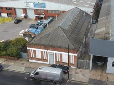 The premises comprise a detached steel-truss frame industrial/warehouse facility. The warehouse area is of a clear open-plan layout with access for loading available via two full height roller shutter doors serviced by a dedicated access road....