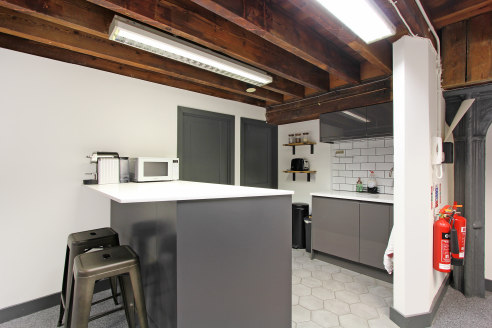 The unit is primarily open-plan, with partitioned meeting space and a generous kitchen. It was recently refurbished to a high standard, which complements the original exposed brick walls and beams. The unit is highly secure, with New Concordia Wharf...