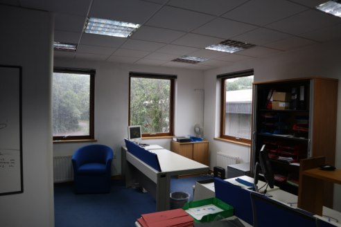 First floor open plan office suite within a purpose built 3-storey end of terrace building with air conditioning in part, 3 on-site car parking spaces and excellent access to junctions 10 and 11 of the M4 motorway.