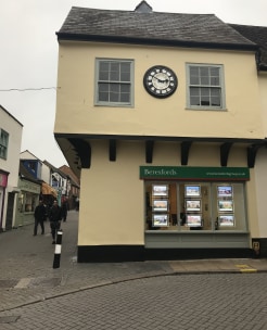 A Grade II listed building dating in parts from the 16th century, the upper storey projecting on the east and south sides, the property is timber framed with a plastered overhang with sash windows, a tiled and slate roof and a diamond mullioned windo...