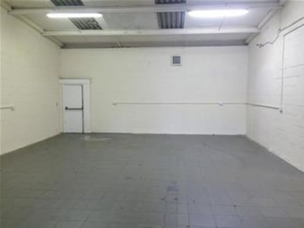 The premises comprise a steel portal frame industrial/warehouse unit of brickwork elevations to a pitched roof. The warehouse benefits from an open plan layout with a small administration office and access is gained via a full height up and over load...