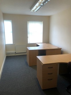 A purpose built terrace office block which provides

self contained accommodation over ground and first floors.

The ground floor consists of 3 private offices with a disabled WC, small kitchen and storage room. 

The first floor provides open plan o...