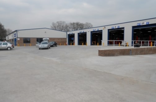 The property comprises a substantial semi-detached industrial premises incorporating garage workshop and MOT centre, parts store, ground and first floor offices and WC facilities on a site of 1.6 acres including extensive secure yard and car parking....