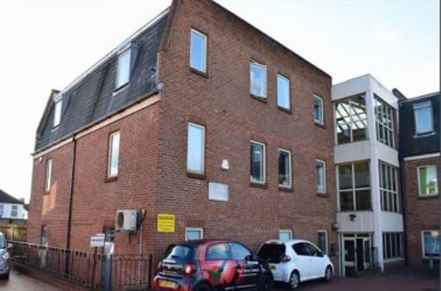 Self contained building arraged on ground and 2 upper floors together with 4 car...