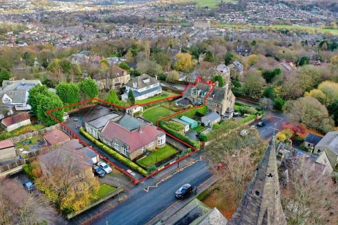 Occupying a total site area of approximately 0.536 acres, the property comprises two separate buildings currently utilised as a school. To the south side of the site and accessible from Parsons Road is a stone built, single storey school building pri...