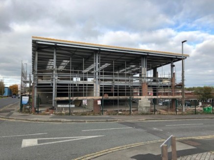 The premises will comprise a terrace of 3 retail units, constructed on a steel portal frame with insulated profile steel cladding to both walls and mono pitched roof, including double skin translucent roof panels above.A full height glazed frontage w...
